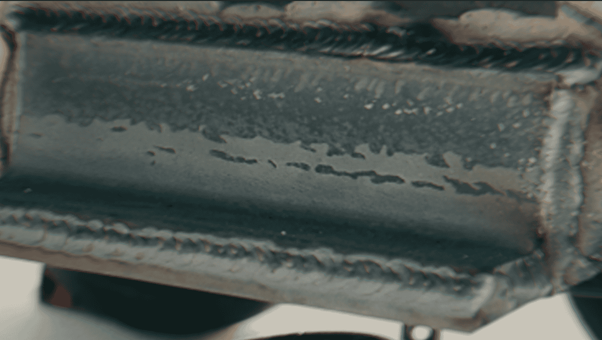 Heavy-duty weld bead on reinforced suspension mounting plate