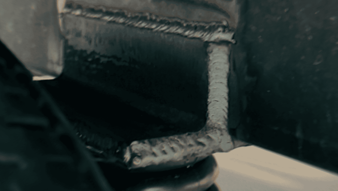 Close-up weld on airbag suspension mounting bracket