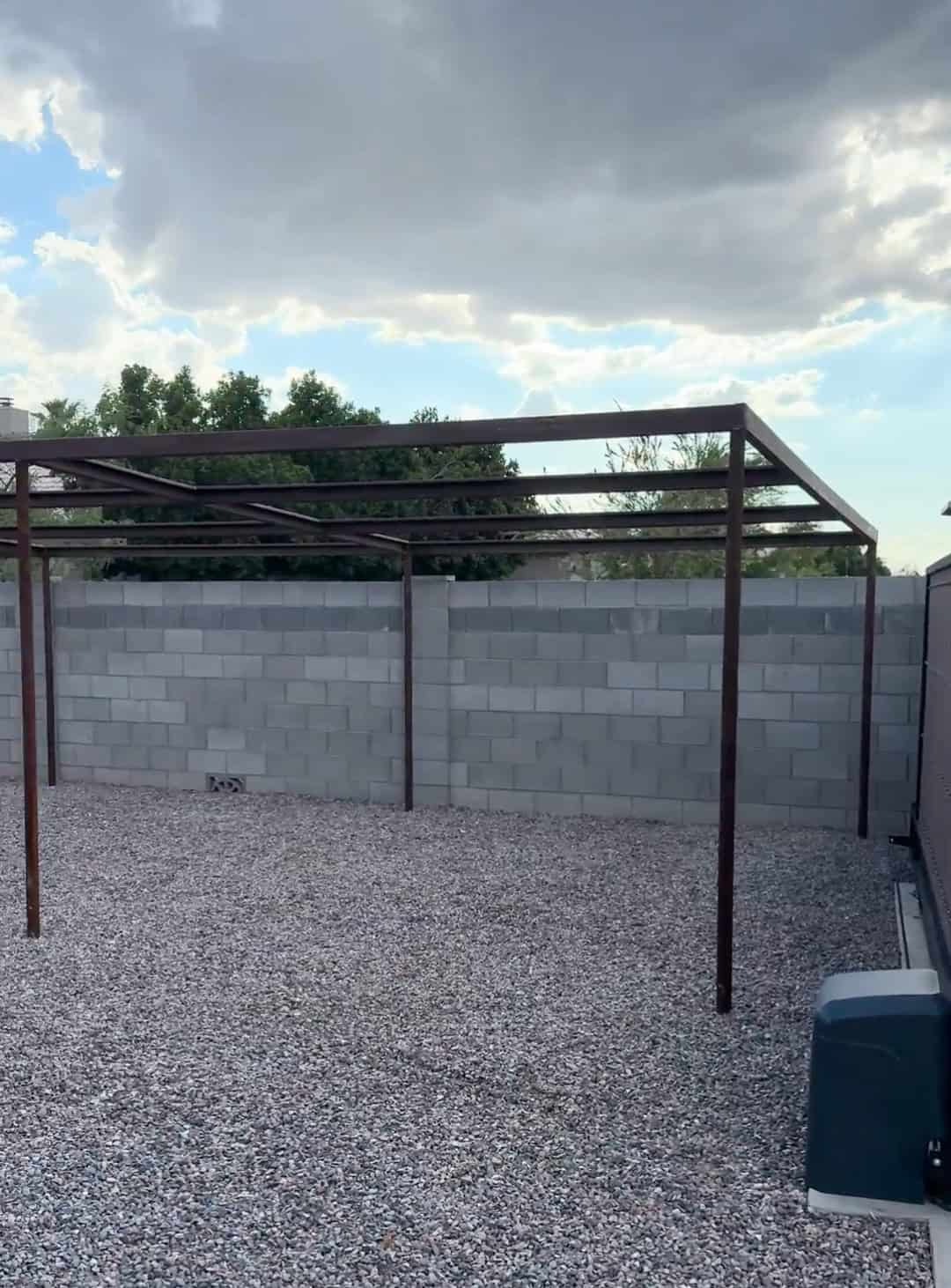 Custom pipe shade structure frame built by Mobile METAL Medics before installation of the PBR metal roof panels.